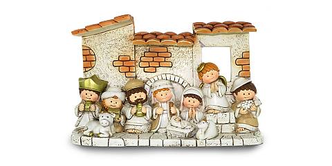 Presepe per bambini con capanna e 10 personaggi in resina - 23 x 15 cm