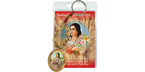 Portachiavi di Santa Maria Goretti in legno d'ulivo con decina, in blister trasparente con preghiera, testi in italiano